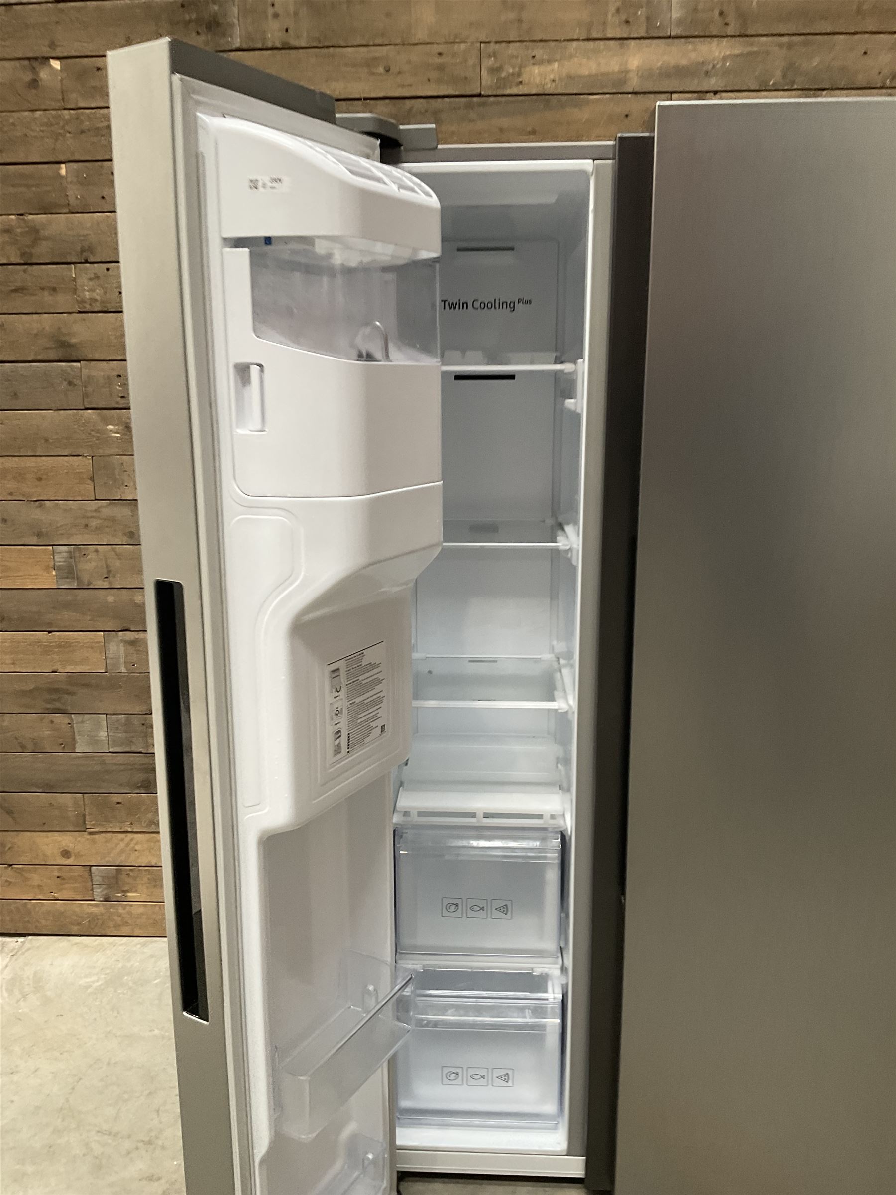 Samsung RS68N8320S9 American style side by side fridge freezer, non plumbed ice and water dispenser. Serial no. 05NT4EBN800405K, August 2020.