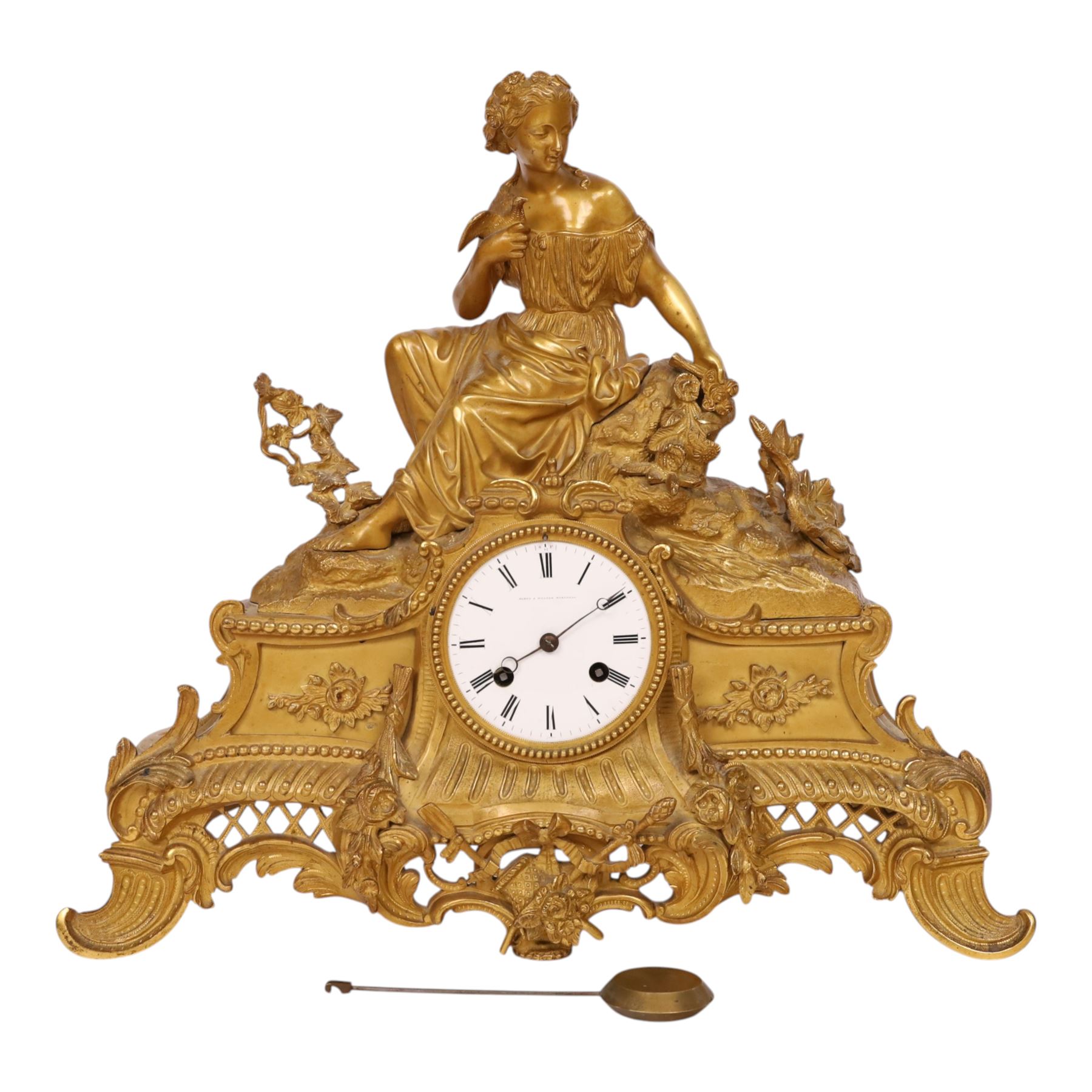 19th century French ormolu mantel clock, retailed by J & W Marshall, Paris, surmounted with a figure of in neo classical dress, with enamelled Roman dial marked James & Walter Marshall, H39cm 
