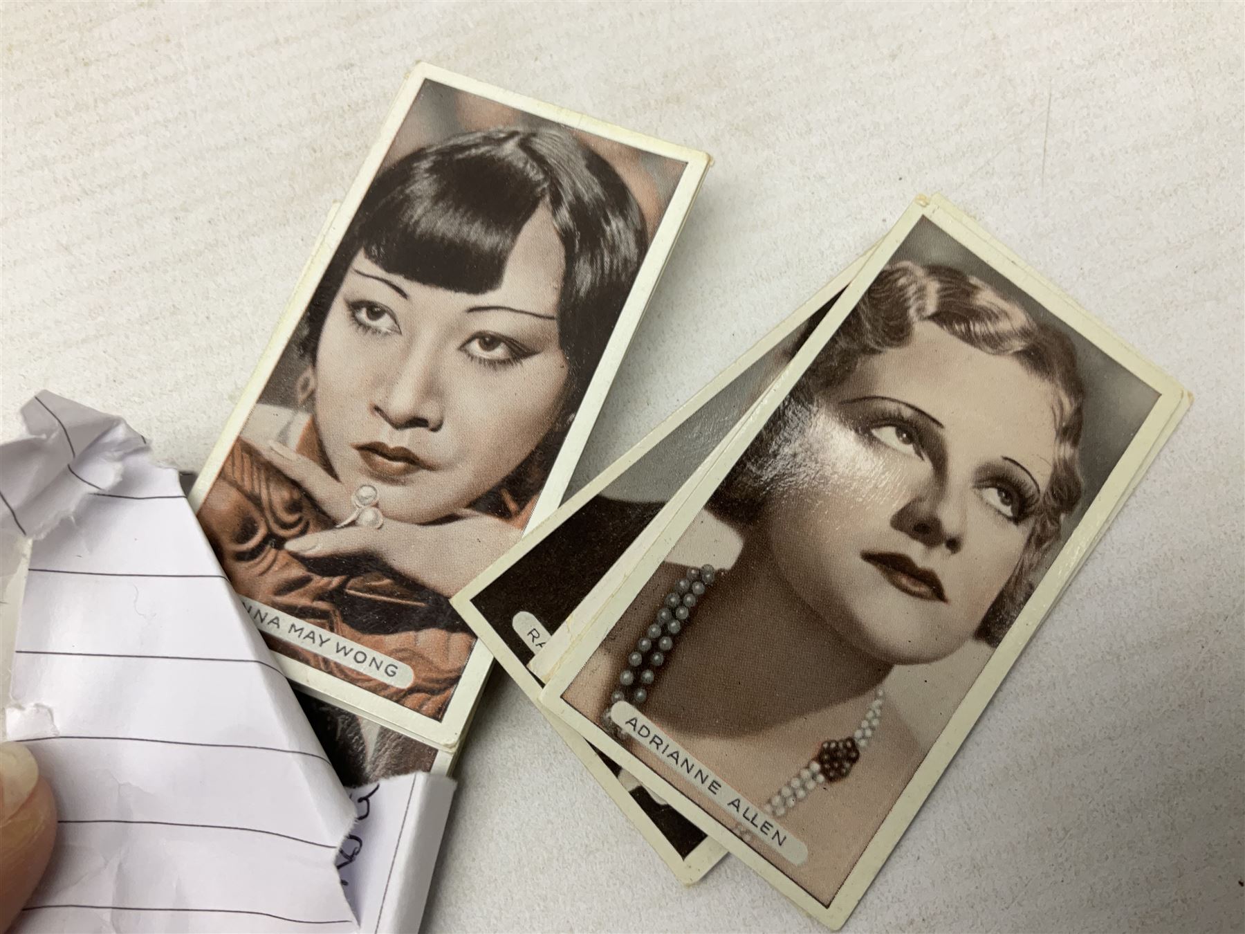 Quantity of mostly cigarette cards, housed in ring binder albums and loose, by Ardath, W.D. & H.O. Wills, John Player & Sons, The American Tobacco Co etc, including famous film stars, cinema stars, wild birds, poultry, dogs etc and various books or catalogues relating to cigarette card collecting, in one box