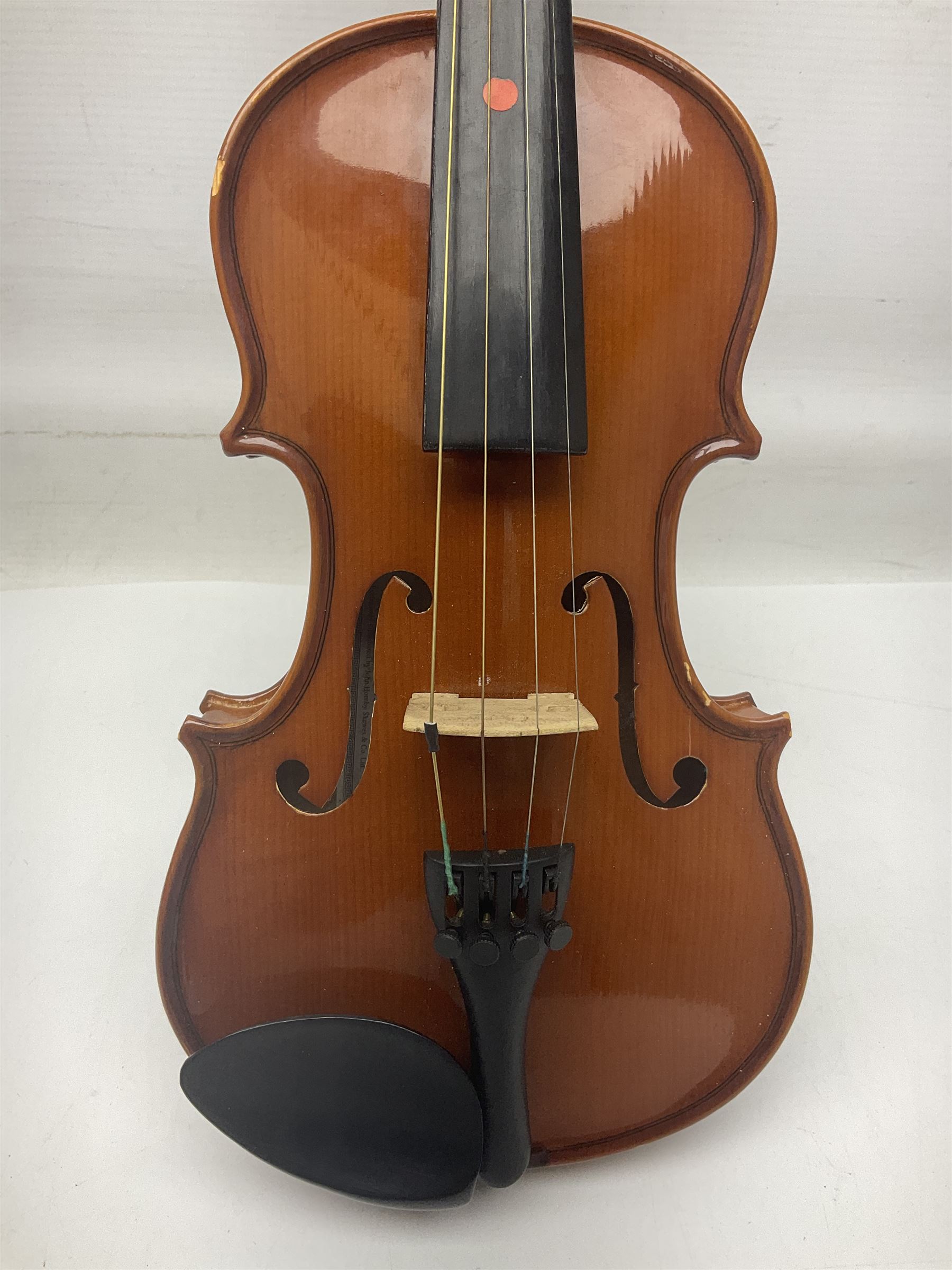 Four Chinese graduated violins - full size with 35.5cm two-piece back; three-quarter size with 33.5cm two-piece back; half size with 31cm two-piece back; and quarter size with 27.5cm two-piece back; all cased except full size; one with bow (4)