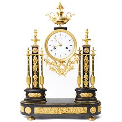 French-Early 19th century 8-day ormolu and polished black slate portico clock, case surmou...
