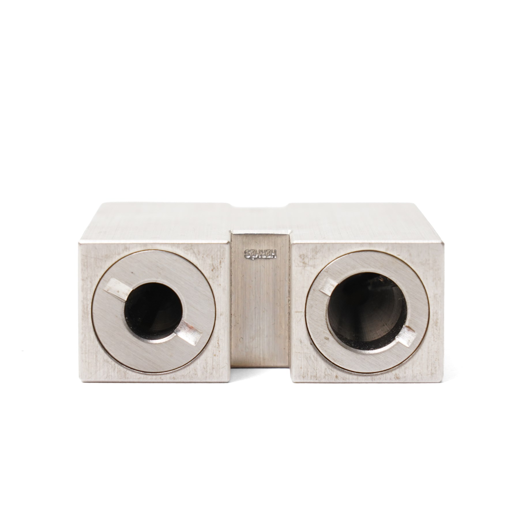 Hermès - ‘H’ pencil sharpener, brushed palladium-tone metal, with black leather-covered pencil, two original boxes and booklet