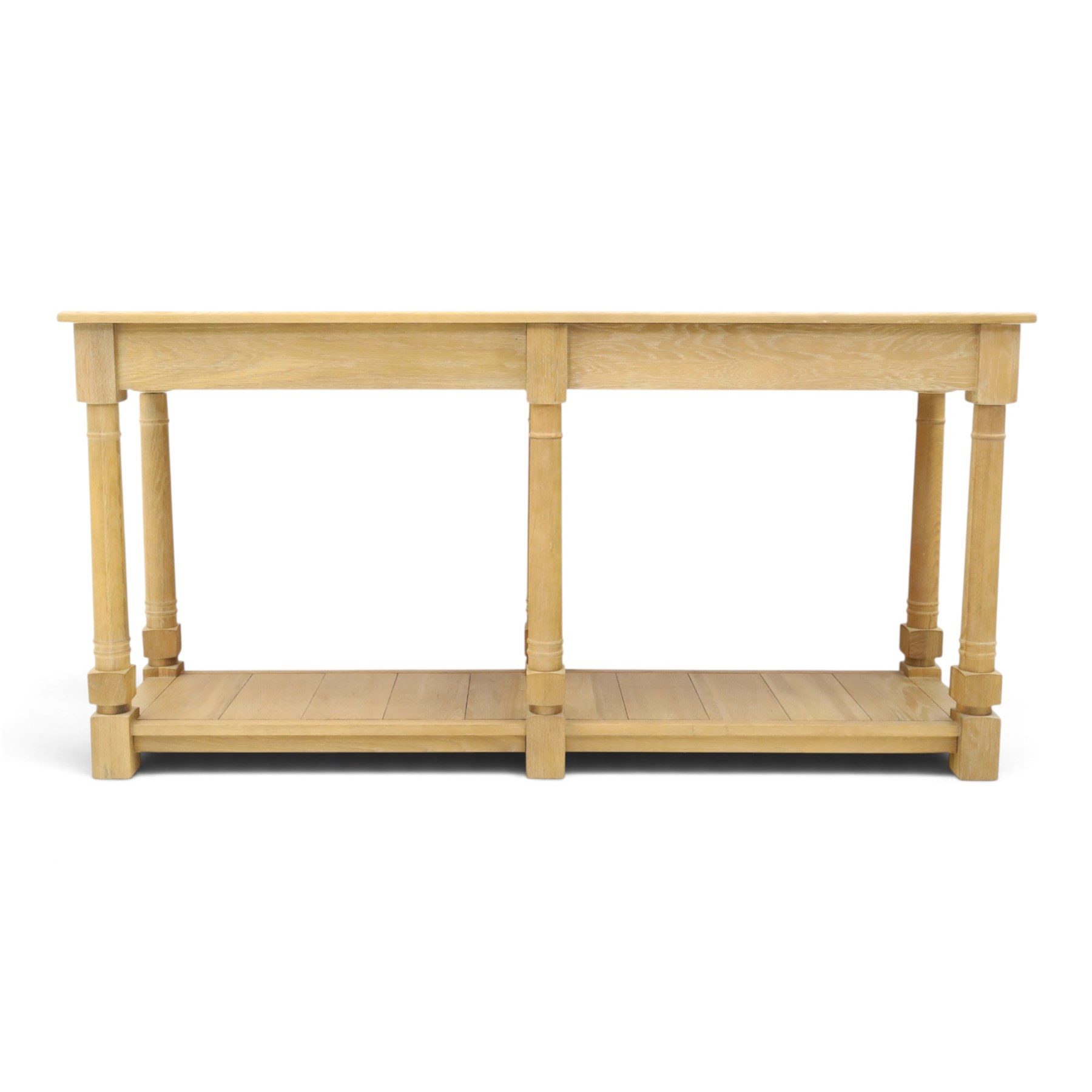 Neptune - 'Edinburgh' limed oak console table, with two
soft close drawers raised on ring-turned column supports,
with a pot shelf raised on square feet