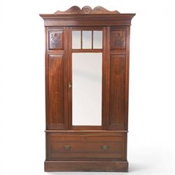 Edwardian walnut wardrobe, featuring single sectional mirror door with bevelled panes, single drawer to base