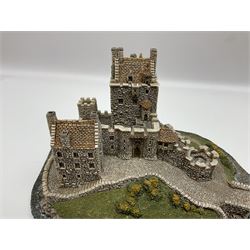 Four Lilliput Lane models from the Scottish Collection, to include Eilean Donan Castle, Claypotts Castle, John Knox House and Stockwell Tenement, all boxed 