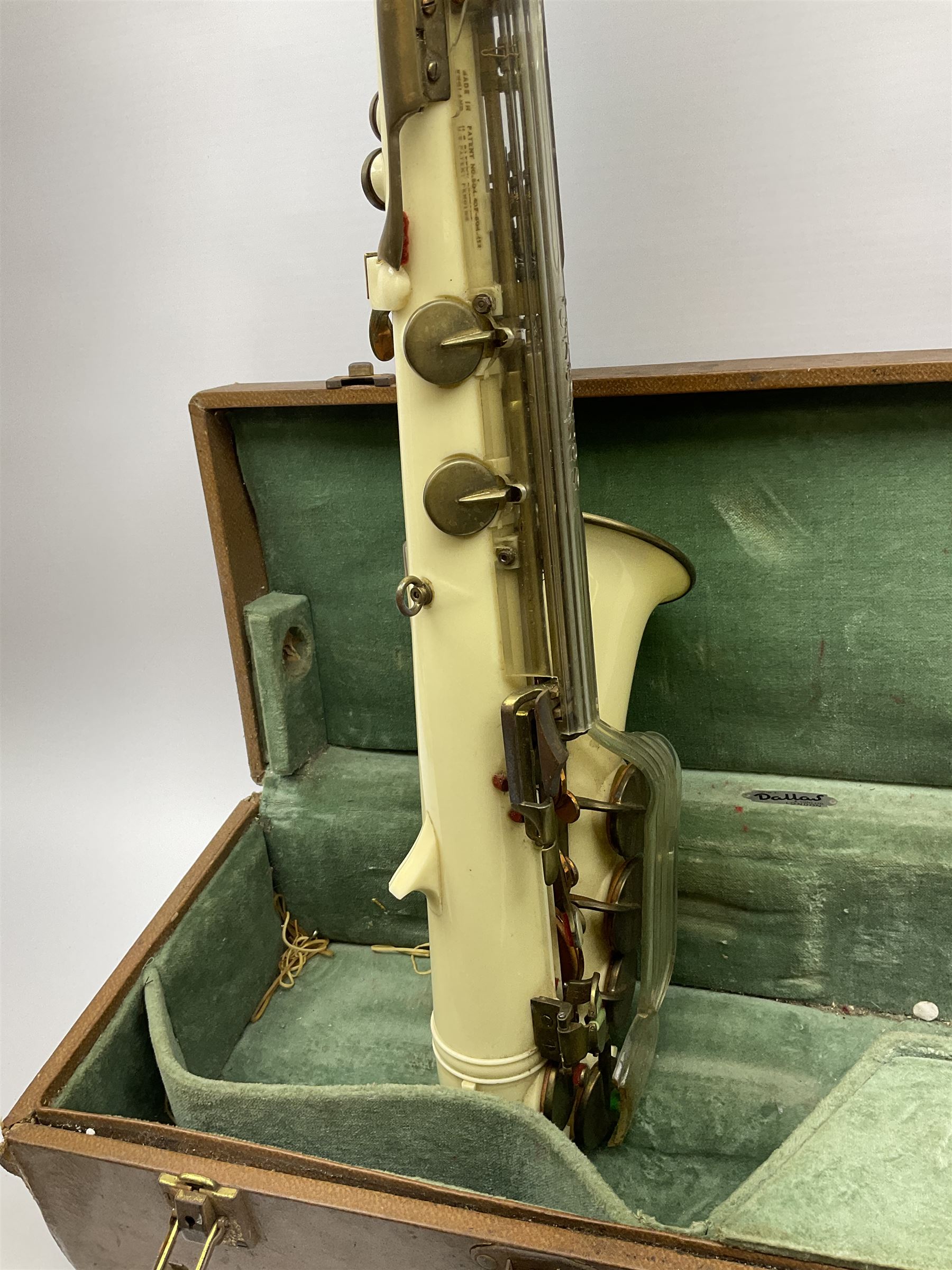 1950s Grafton injection moulded cream acrylic plastic alto saxophone designed by the Italian Hector Somorisen and distributed by John E. Dallas & Sons London, serial no.10776 L66cm, in original fitted carrying case