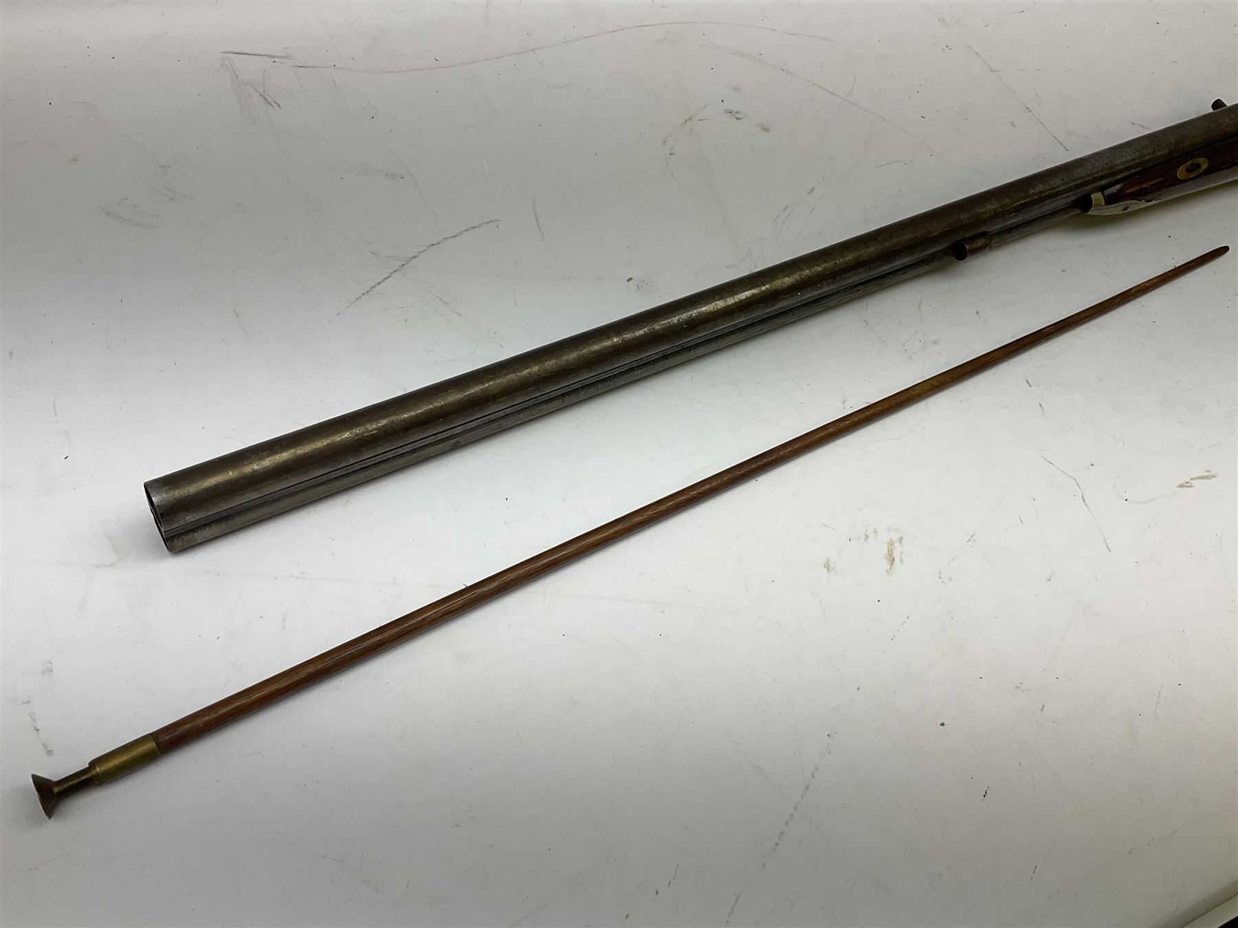 19th century 13-bore double barrel side-by-side percussion cap shotgun, the 72cm stub twist damascus barrels with ramrod under, walnut stock with chequered grip L117.5cm overall