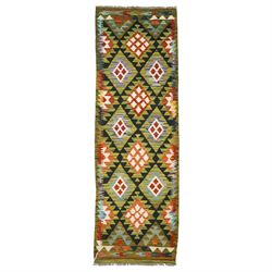 Chobi kilim flatweave runner, with a repeating stepped diamond medallion design in green, ...