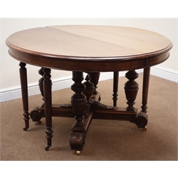  19th century French walnut dining table, pull out action with central turned and carved four column support and pair of turned legs to each end, extending to accommodate up to five extra leaves, W308cm, H73cm, D130cm  