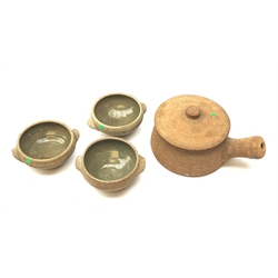 A Leach Pottery lidded casserole dish, including handle L25cm, together with three bowls, D14.5cm, each with impressed studio seal. 