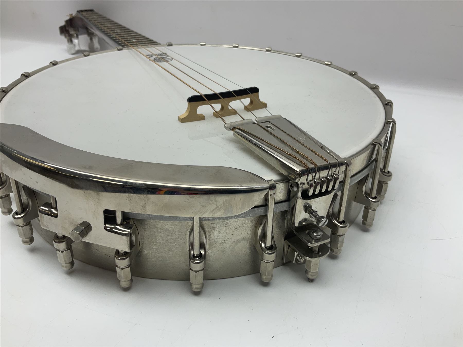 Deering seventeen-fret tenor banjo with cast metal body, serial no.H275, L79cm overall; in fitted hard carrying case