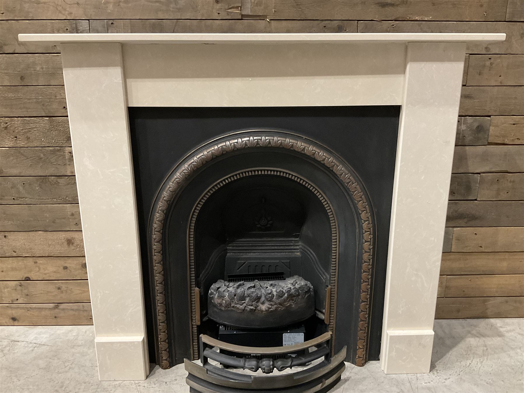 Aurora Dorchester Black Fire suite - granite style surround with cast iron insert, electric fire with remote and black hearth