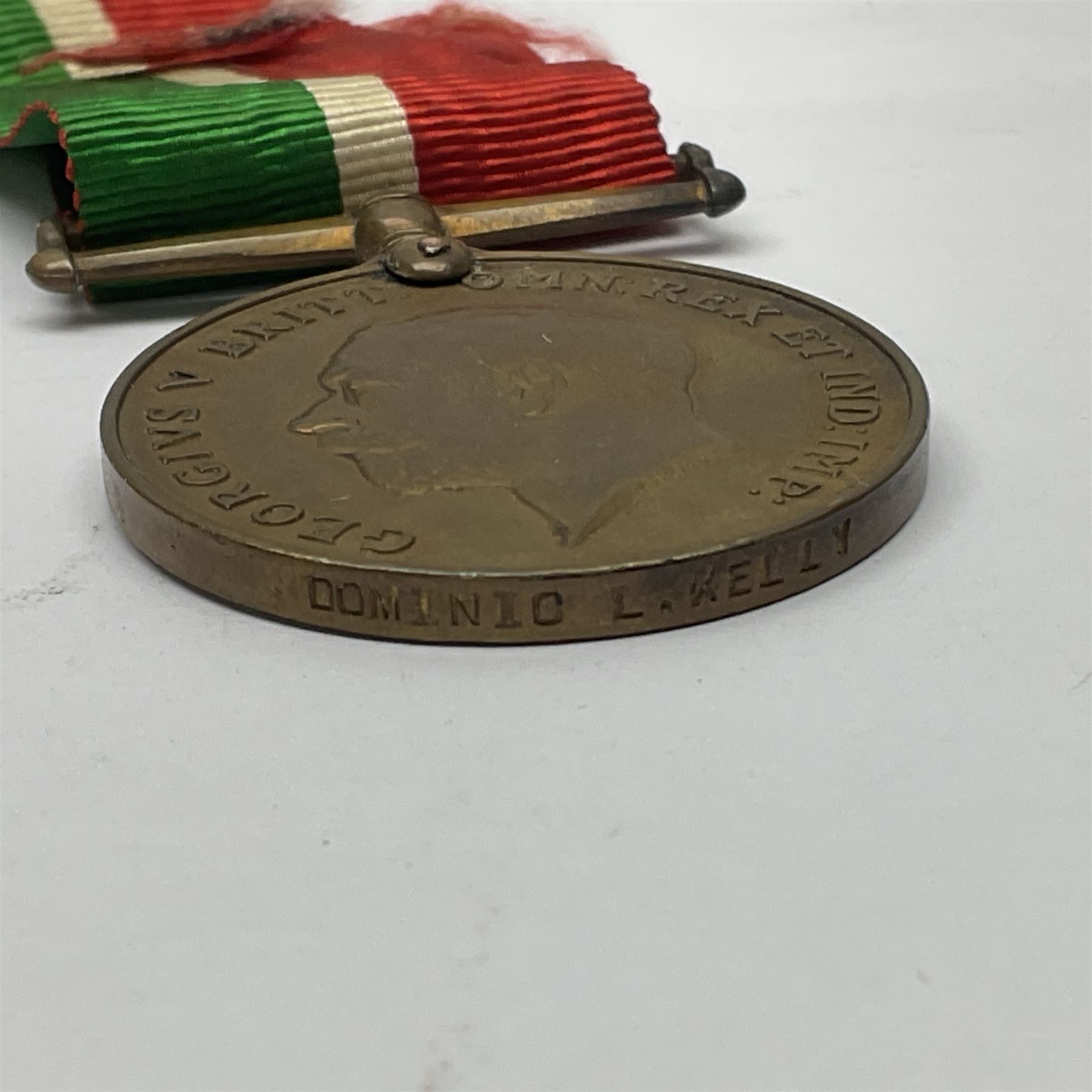 WWI pair of medals comprising Mercantile Marine medal and British War medal, awarded to Dominic L Kelly; both with ribbons and part original packaging and a Victoria Diamond Jubilee medallion.