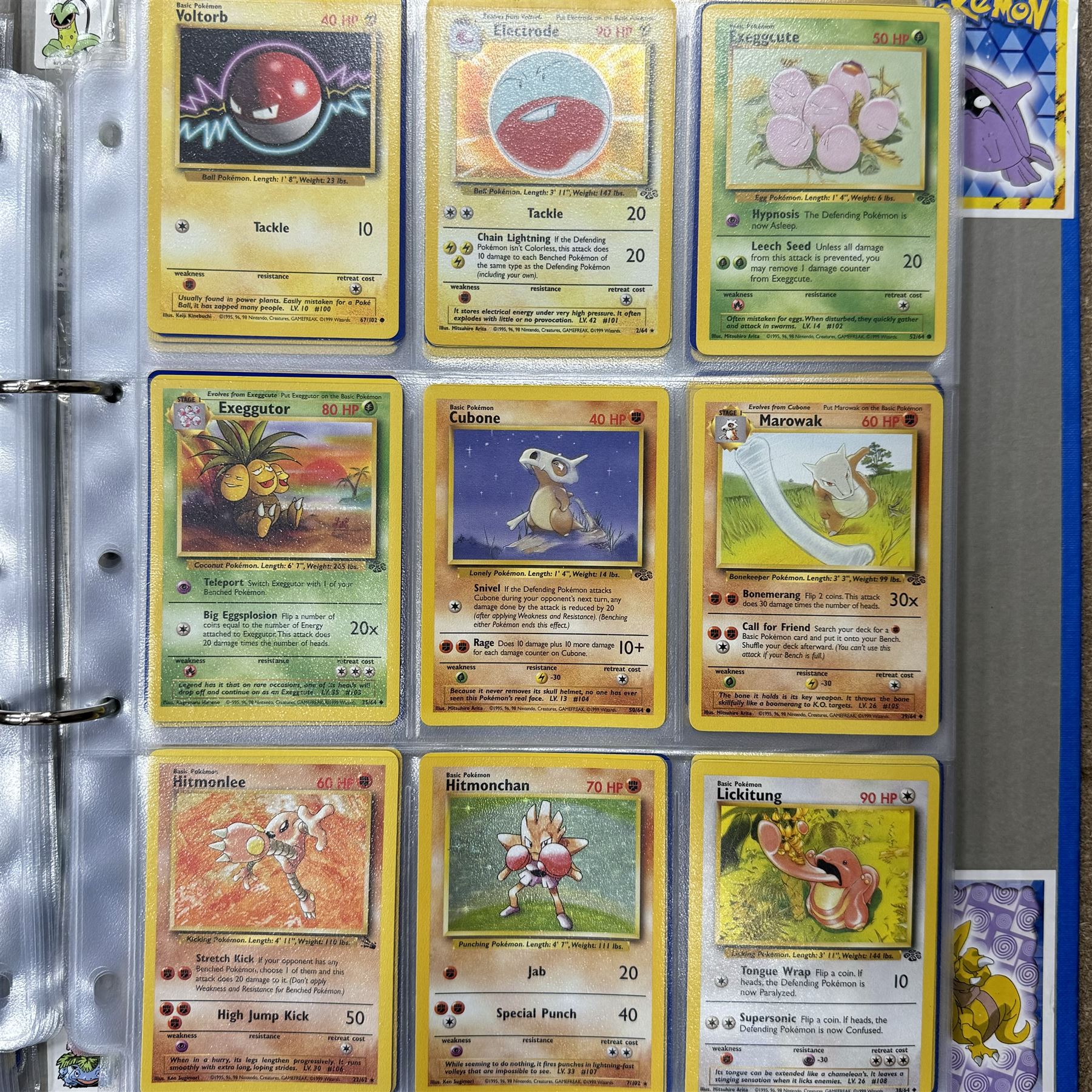 Collection of approximately 400 Pokemon trading cards, mostly 1999 Wizards Pokemon cards to include 1st Edition Dark Gyarados holo 8/82, Dark Charizard 4/82 holo and 21/82 non holo, Dark Blastoise 3/82 holo and 20/82 non holo, Dark Raichu holo 83/82, Dark Dragonite 22/82, eleven first edition cards, Japanese cards, Trainer cards, etc, together with an album of Pokemon the First Movie cards, a voice actor signed copy of Pokemon: The First Movie Animation Comics Mewtwo Strikes Back #1, 5305/8000 with certificate of authenticity with comics 2, 3 and 4 