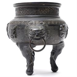 Early 19th century Chinese Qing Dynasty bronze censer, the body of globular form with circular neck and twin cast lion mask ring handles, decorated with applied figures of a monkey, deer and bird, against a key fret detailed ground, the whole upon three zoomorphic elephant feet, H16.4cm D12cm