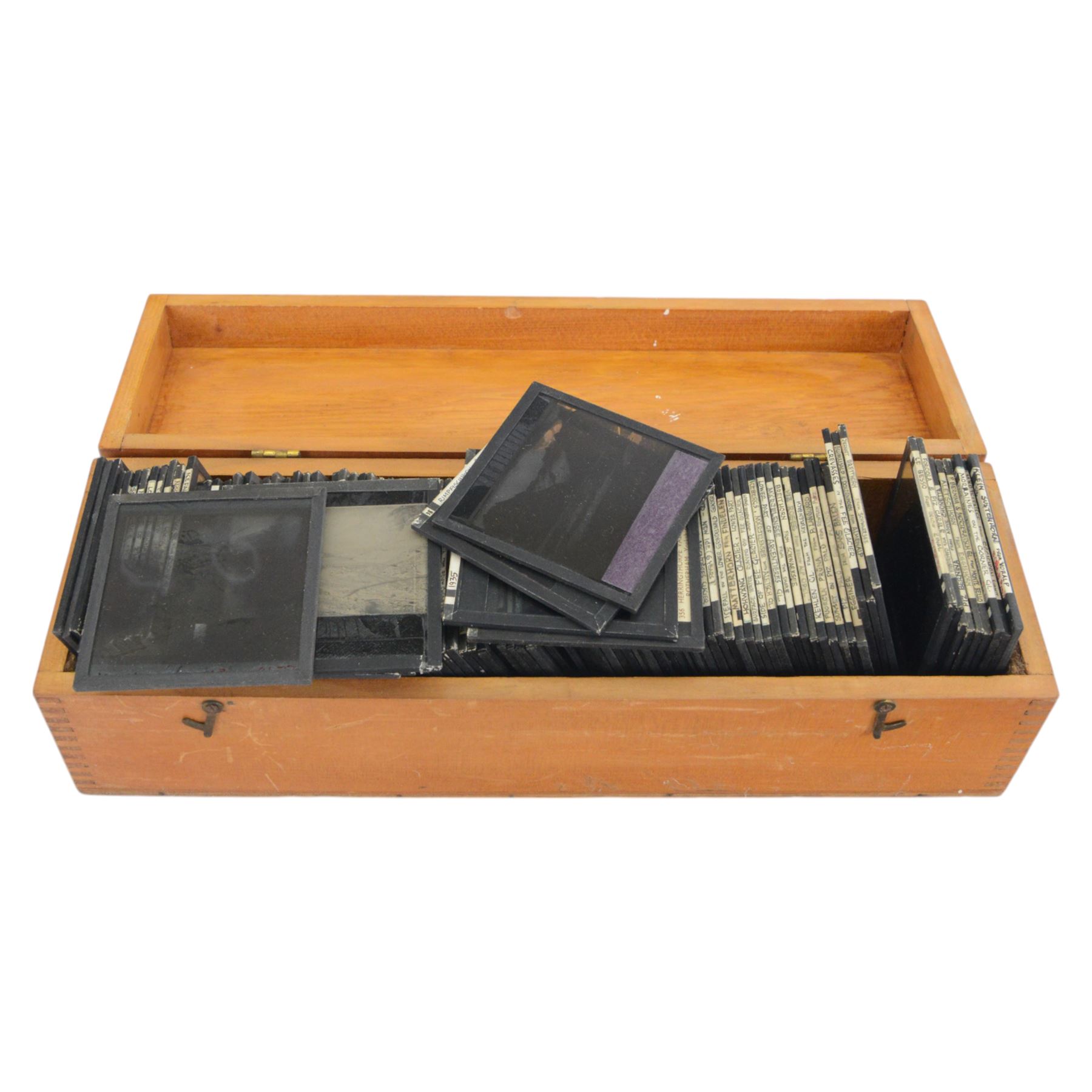 Collection of over 400 magic lantern slides, on various subjects including UK and World travel, orchids, mathematics, geometry, circuitry, religion and prayer