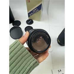 Group of camera lenses, comprising Yashica AF 70-210mm 1:4.5 58mm lens serial no. F6106983, boxed, Yashica AF 35-70mm 1:3.3-4.5 52mm Macro lens serial no. F60231147, Yashikor Aux Wide Angle 1:4 lens and a Yashikor Aux Tele-Photo 1:4 lens, Mamiya-Sekor E 1:2.8 f=28mm serial no. 13427 and a Mamiya-Sekor Zoom E 1:4 f=80-200mm lens serial no. 11271