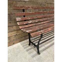 Wrought metal and wood slatted garden bench