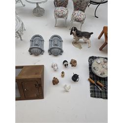 1:12 scale dolls house conservatory and garden accessories, including white wooden glazed conservatory on a stone effect base, black and white metal garden seating, barbecue, plant shelves, parasol, barbeque accessories, large planters, rabbit hutch, animals, chimenea, etc