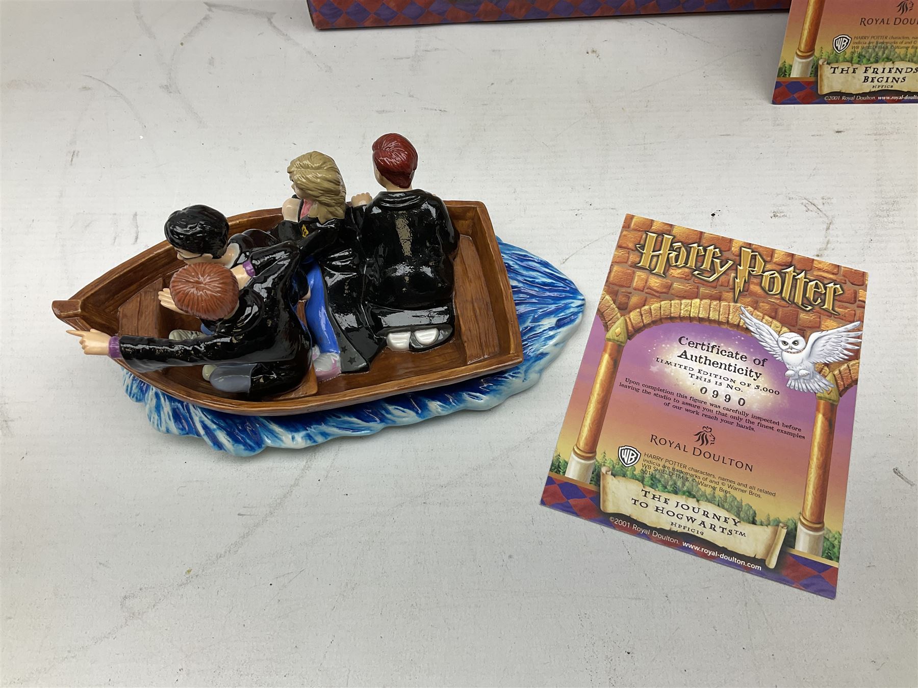 Three Royal Doulton limited edition Harry Potter groups - 'Harry's 11th Birthday' No.2967/5000; 'The Journey To Hogwarts' No.990/5000; and 'The Friendship Begins' No.3969/5000; all boxed with certificate (3)