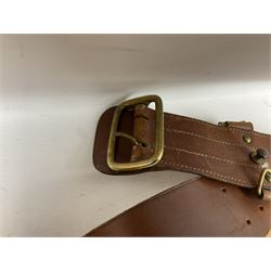 British Army General Staff officer's peaked cap by Herbert Johnson London in Moss Bros. delivery box; two officer's Sam Browne leather belts; leather pistol holster and sword hanger; pair of leather gloves and pair of spurs