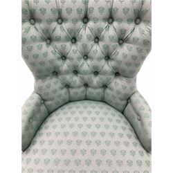 20th century Victorian style nursing chair, upholstered in green buttoned fabric