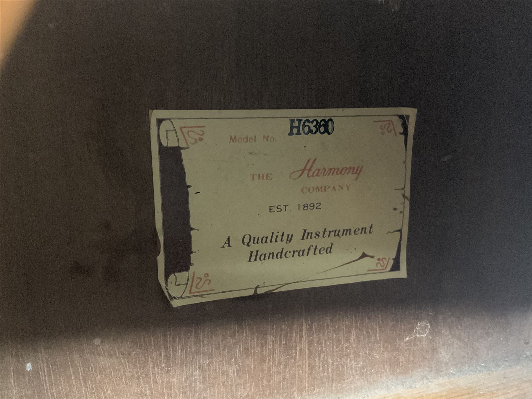 Harmony Model H6360 acoustic guitar in mahogany with spruce top, L103cm overall; and 1970s B&M (Barnes & Mullins) Concert Grande acoustic guitar, L101.5cm overall; each in hard carrying case (2)