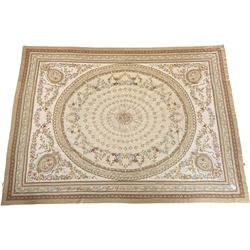 Late 20th century French style needle work Aubusson rug, circular field decorated with floral garlands and flower head motifs, multi-band border