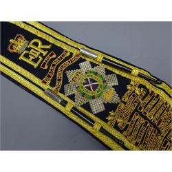  ERII 'The Black Watch Royal Highland Regt.' Drum Major's gold braid sash, decorated with Campaign role and ebonised and silver plated miniature drumsticks,    
