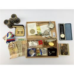 Two 1990 five pound coins on cards of issue, commemorative crowns, banknotes, early 20th century leather bound binoculars, pair of spurs, pocket watch, WW2 medals, Everite wristwatch and miscellanea 