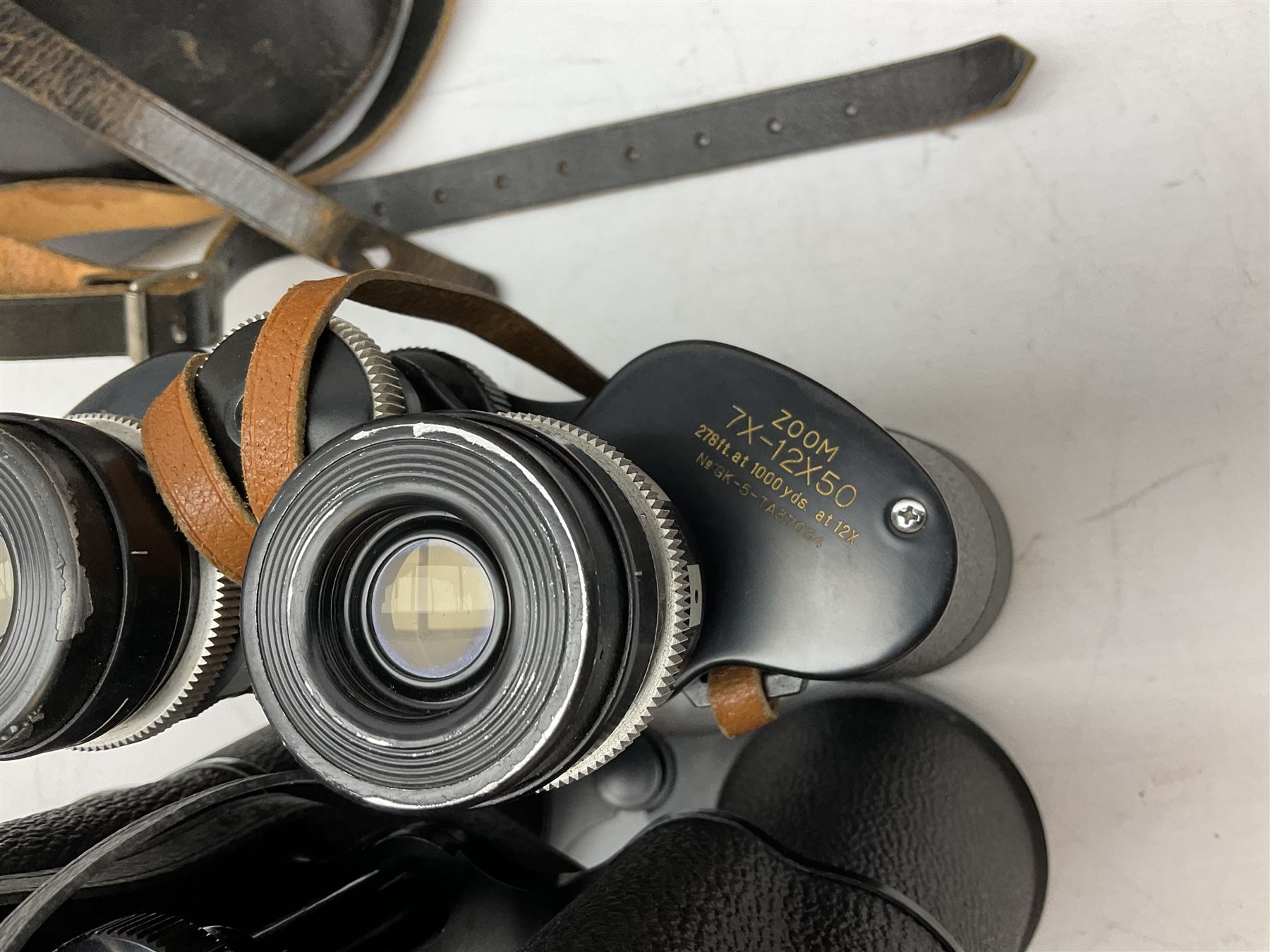 Nine cased pairs of binoculars, to include Tohyoh 22x70, Greenkat 7x- 12x50, Chinon, Fisher-Dietz 7x50, etc