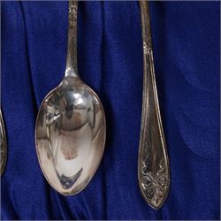Set of  of six silver coffee spoons and tongs with bright cut decoration Sheffield 1908 Maker Cooper Bros. and another set of six coffee spoons with decorative terminals