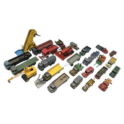 Dinky - twenty-six unboxed and playworn die-cast models including Foden Regent Tanker, two Foden lorries, Pressure Refueller No.642, Snow Plough, Elevator Loader, Foden Dump Truck, Blaw Knox Bulldozer and other commercial vehicles