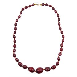 Single strand graduated oval cherry amber bead necklace