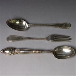 Victorian silver spoon and fork set, each with bead rim and engraved monogram and a silver spoon with scroll handle, with bright cut engraving to underside of bowl, all hallmarked 
