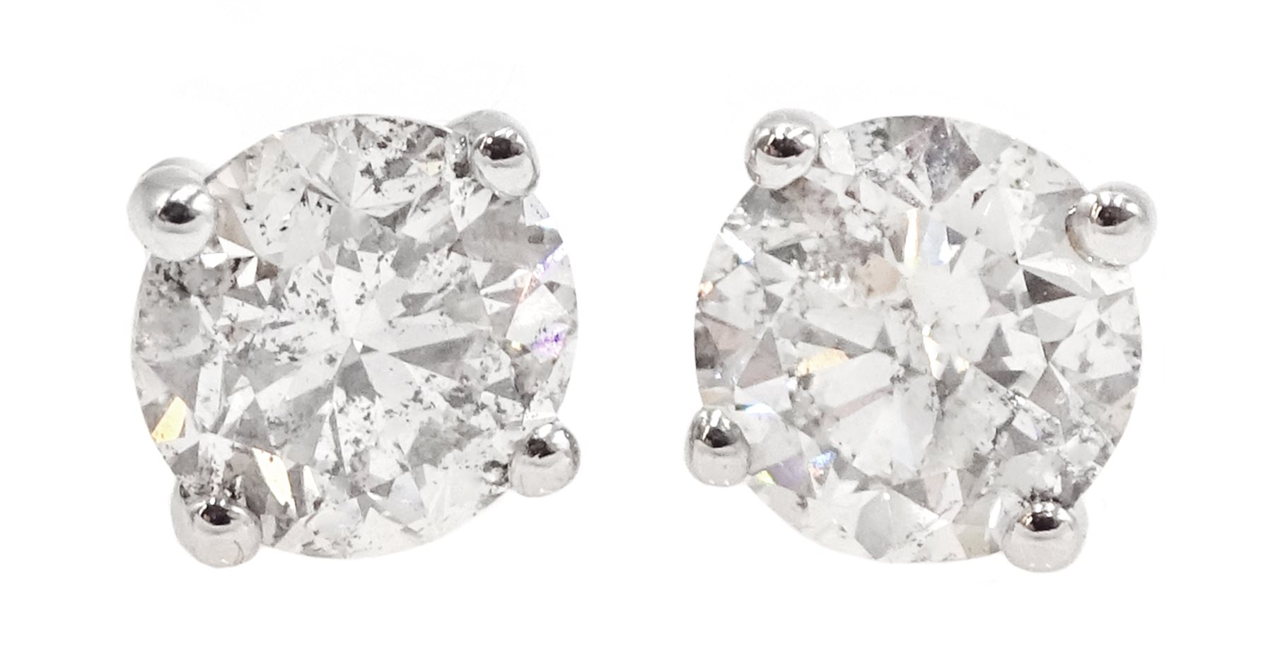  Pair of 18ct white gold round brilliant cut diamond stud earrings, hallmarked, diamond total weight 1.05 carat  