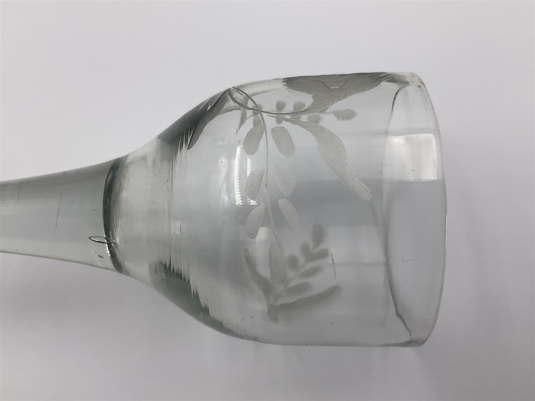 Pair of 18th century Jacobite style wine glasses, the ogee shaped bowls engraved with a single rose and sprig, plain stems upon conical folded feet H13cm