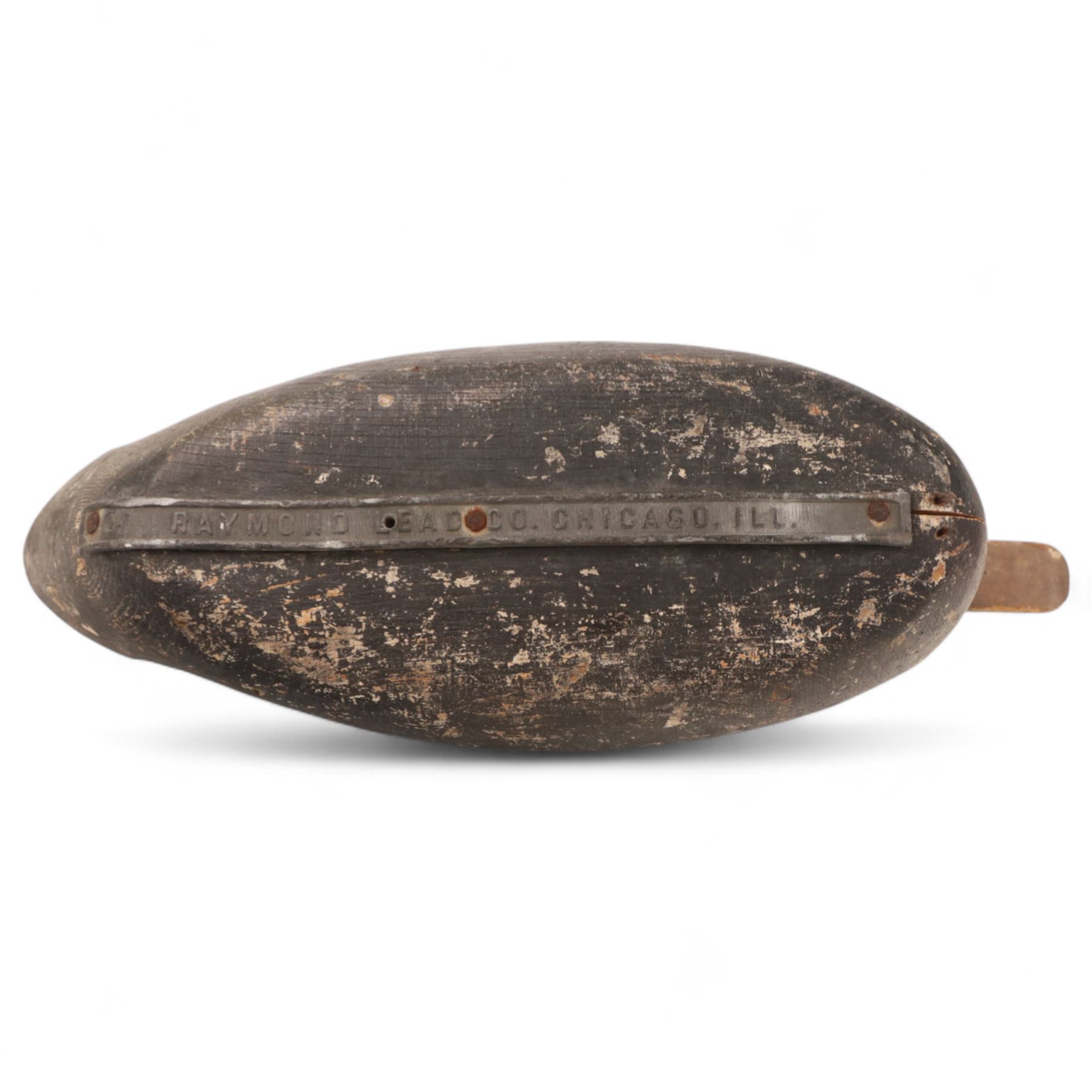 Early 20th century American carved wooden decoy duck, with weight beneath marked CJ Raymond Lead Co Chicago, H19cm, L40cm