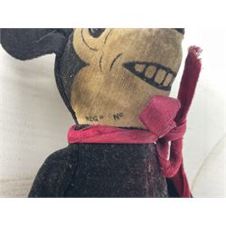Deans Rag Book Mickey Mouse soft toy, circa 1930's, black velveteen head and body, with cream face and hands, red shorts and yellow felt shoes, marked Reg. No. 750811 to neck H19cm