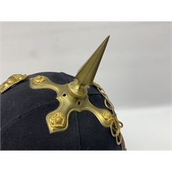 Post-1902 Welsh Regiment Officer's Home Service Blue Cloth Helmet with gilt metal King's crown helmet plate to the front, a removable spike to the top on a shaped cruciform base with rosette fittings, rosette side bosses, brass trim to the front peak, and leather and velvet backed chin scales, with sweat band, the interior with the remains of a makers label at the address 1,3 & 5 Lexington Street, Golden ? London W (presumably Hobson & Sons)