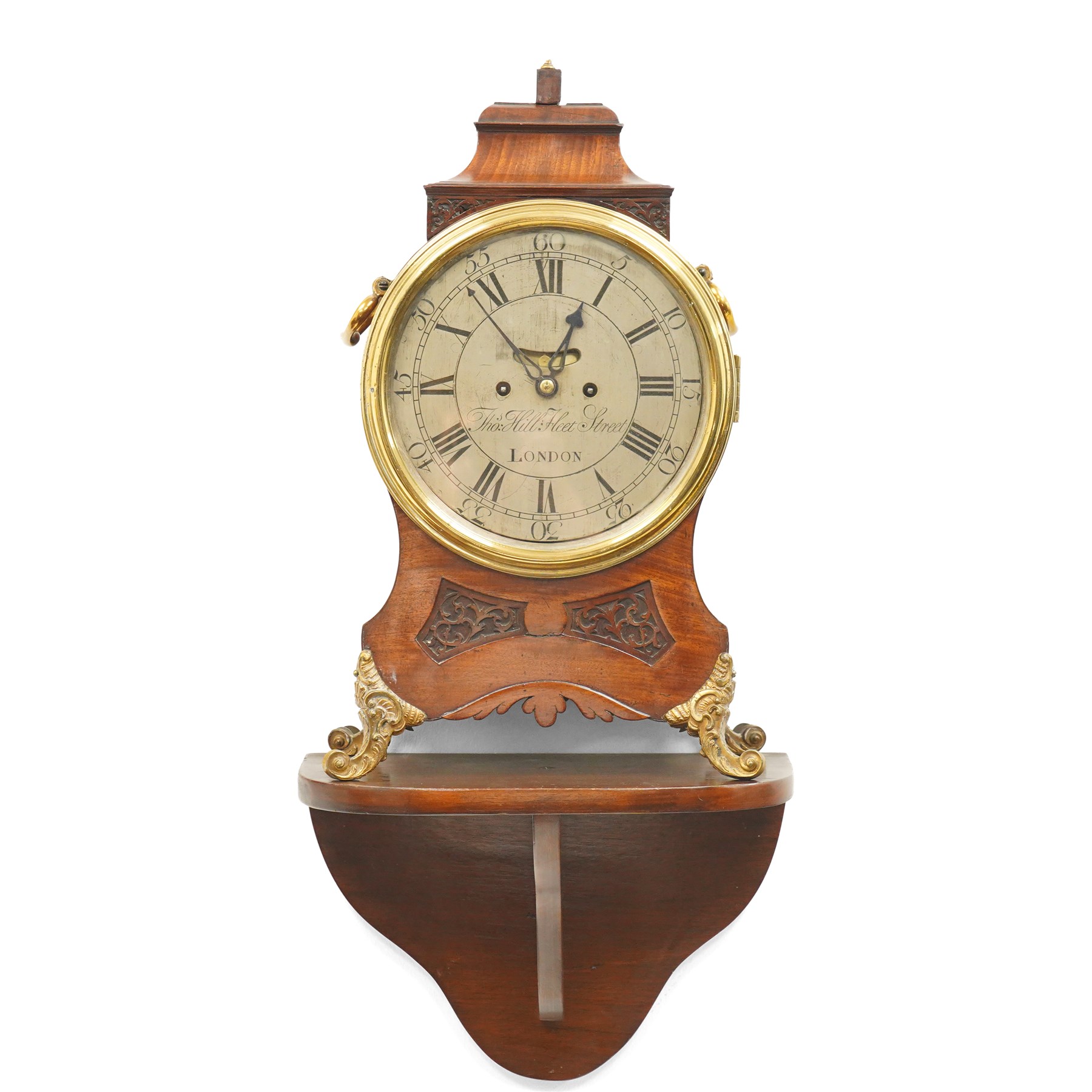 18th century bracket clock with twin chain fusee movement, the steel dial inscribed Thomas Hill, Fleet Street, London in mahogany case with blind fret carved panels, brass handles on gilt brass scroll feet with a later mahogany bracket H50cm excluding bracket
