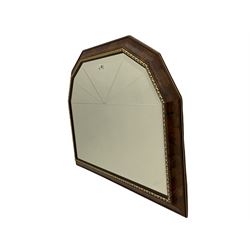 Late 20th century oval bevelled mirror in gilt frame decorated with ribbons and trailing foliate (95cm x 65cm), and a canted rectangular mirror in painted finish and gilt frame (98cm x 68cm)