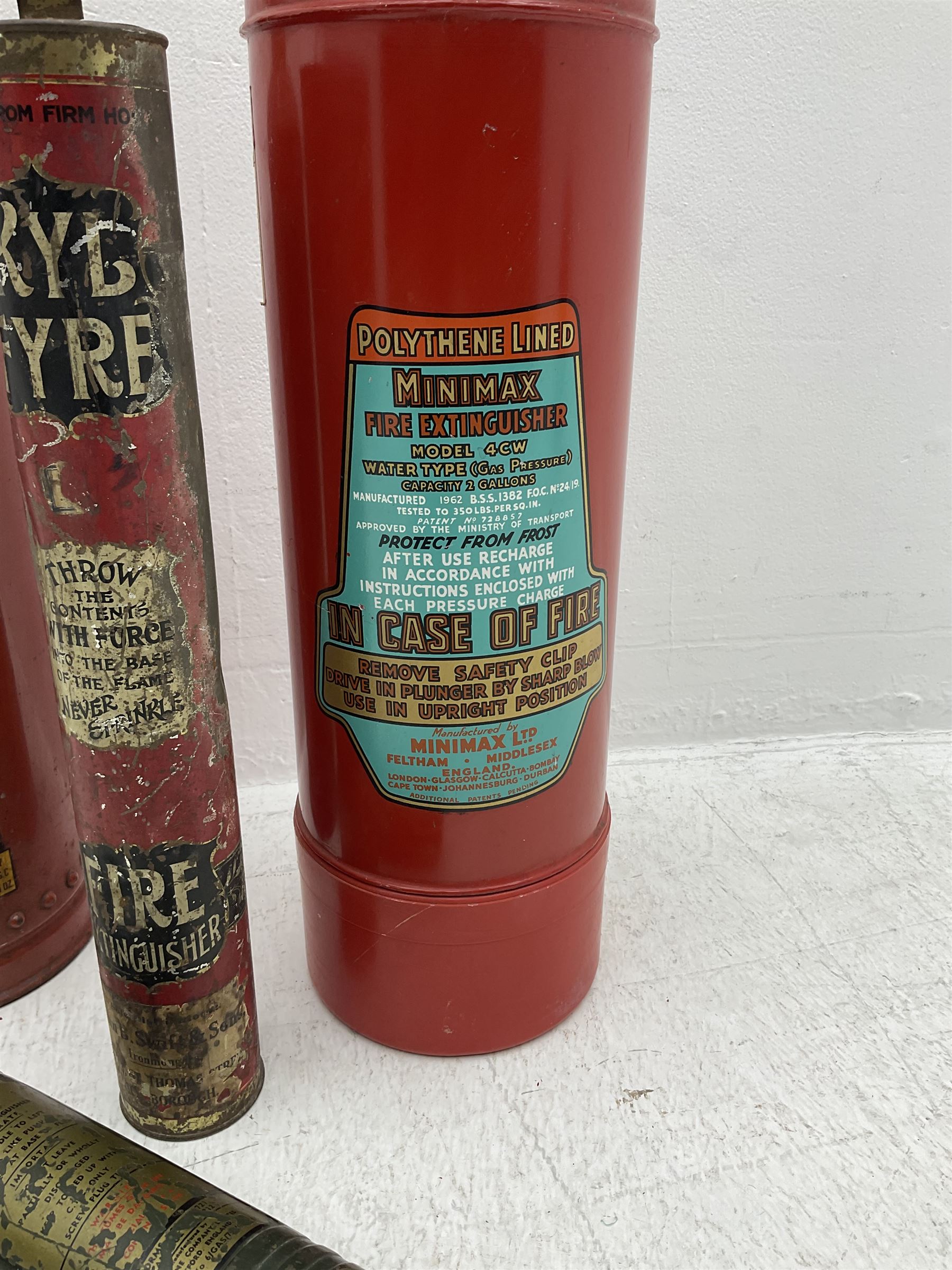 Early 20th century Kyl Fyre dry powder fire extinguisher, together with a Pyrene C.T.C fire extinguisher, and two larger fire extinguishers comprising a 1962 Minimax example and a Lister example, tallest H66cm