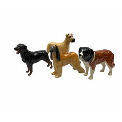 Beswick figures, comprising Afghan Hound 2285, St Bernard 'Corna Garth Stroller' 2221, Rottweiler 3056, Greatdane 'CH Ruler of Ouborough', Fox, Elephant, and dappled grey type horse. 
