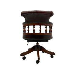 Late 20th century swivel desk chair, upholstered in ox-blood studded leather