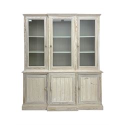 Contemporary light pine breakfront dresser, the upper section with three glazed doors encl...