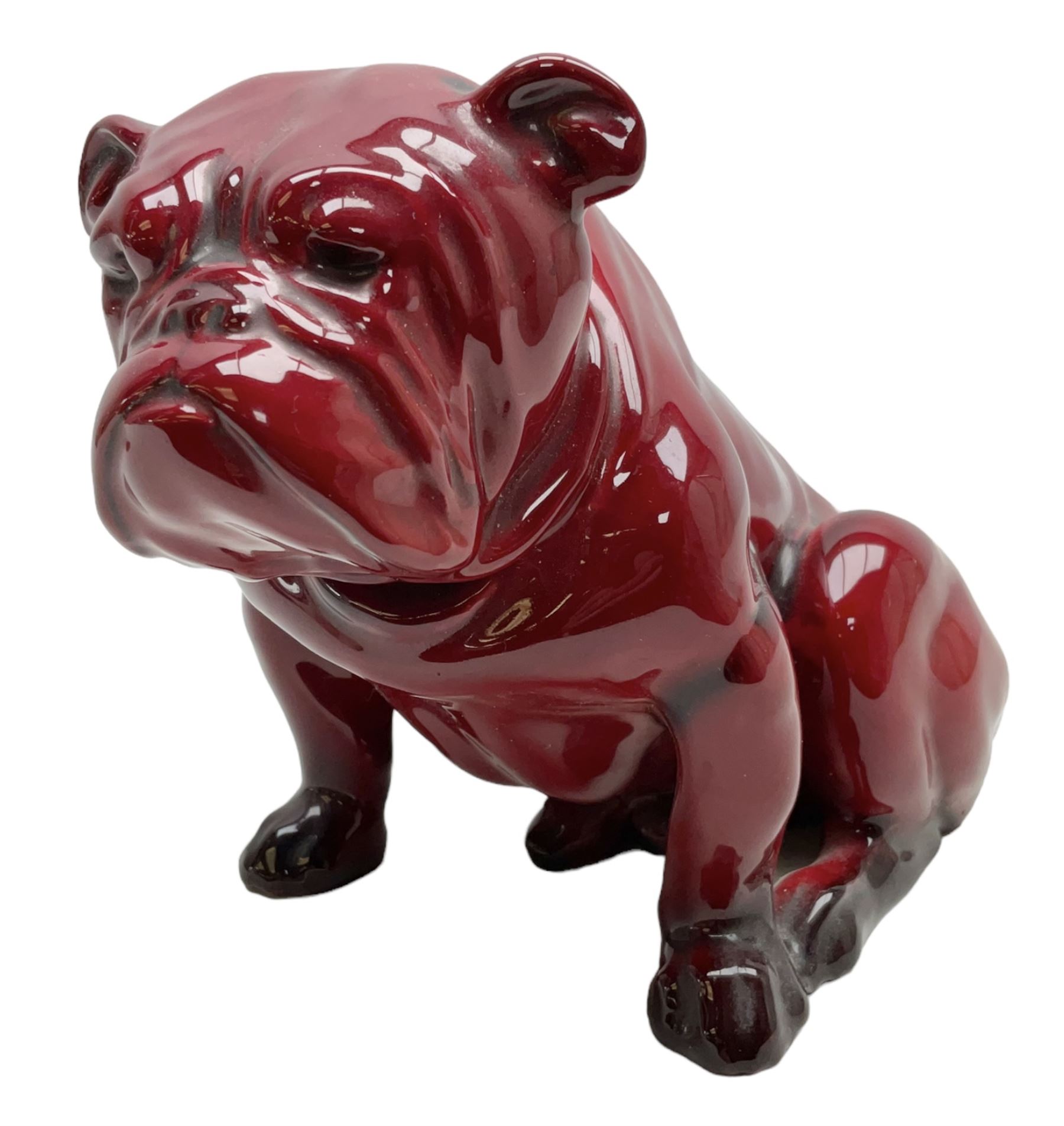 Royal Doulton Flambe figure of a Bulldog, modelled seated, model no 135, with printed maker's mark and K and impressed 135 beneath, H13.5cm