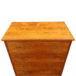 Cabinet-made oak chest, fitted with four soft-close drawers, brass swan neck handles and pierced backplates, on bracket feet