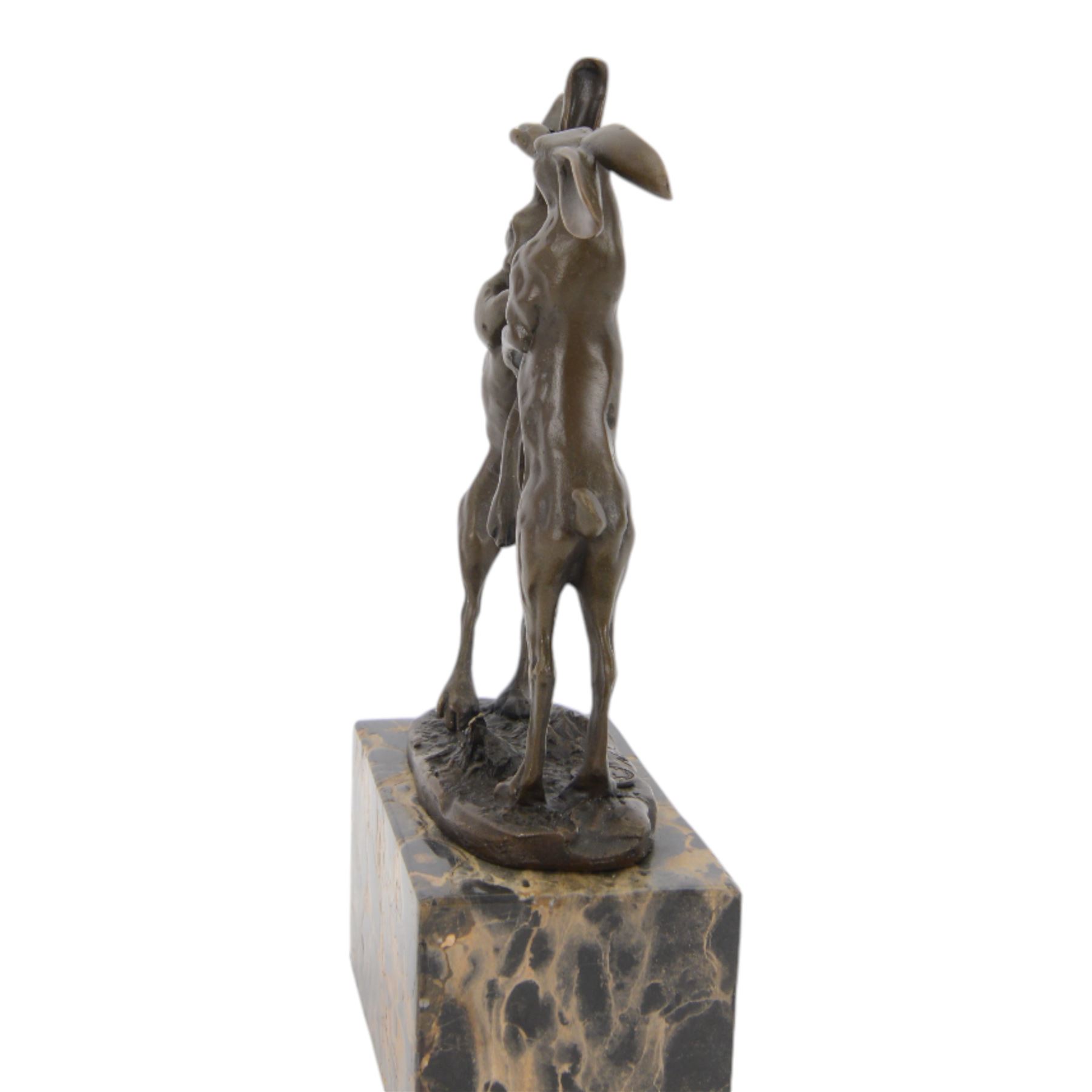 Mario Nick (Modern): two hares boxing, bronze figure group, signed Nick and bearing foundry mark, upon rectangular stone plinth, overall H23.5cm
