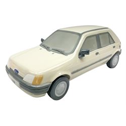Lladro figure, Ford Fiesta, modelled as a Ford in beige, special commission by the Ford factory in Valencia, original box, no 7608, year issued 1989, year retired 1989, H9cm 